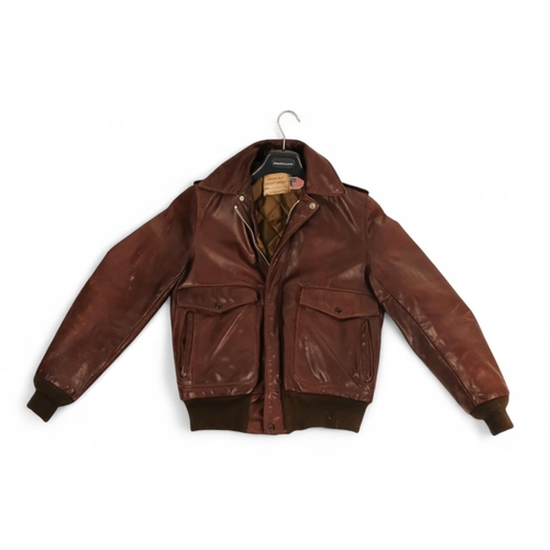 393 - An American Schott of New York brown leather flying jacket - internal label inscribed  'I-S-674-M-S'... 