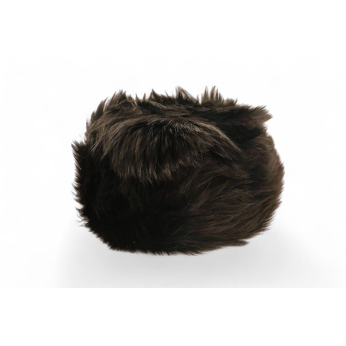 399 - A 20th century fur stole - together with a hat.