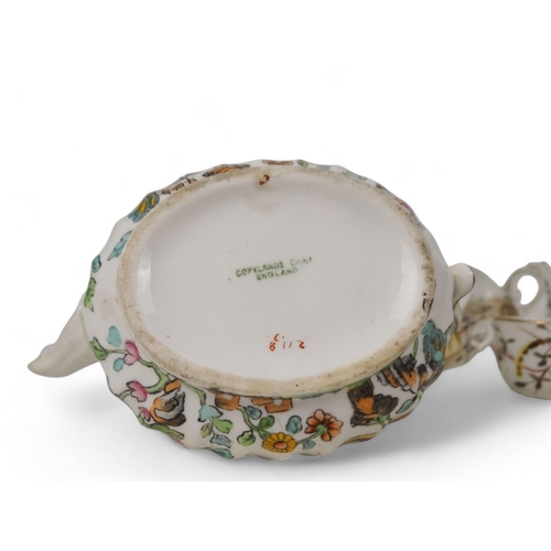 475 - An early 20th century dolls tea service - decorated with foliage on a white ground, comprising five ... 