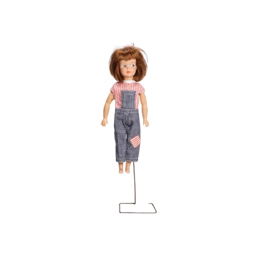 477 - A Pedigree 'Patch' (Sindy's little sister) doll - brunette, apparently little used, with stand, band... 