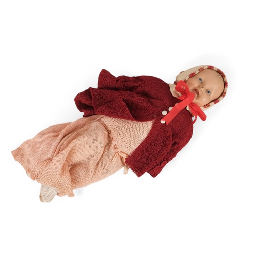 481 - An early 20th century bisque head doll - with articulated eyes and open mouth, composition body and ... 