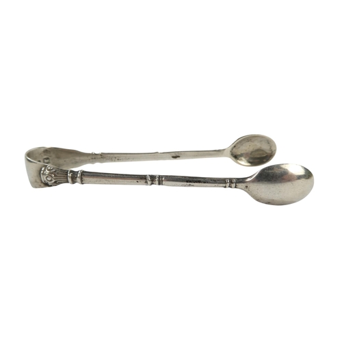 492 - A pair of Georgian silver sugar nips - together with another pair, 56g.