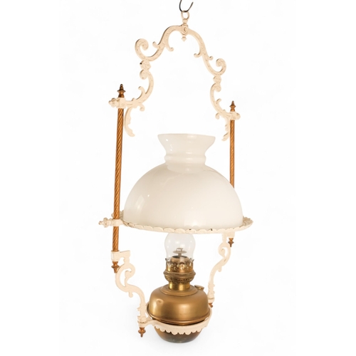 54 - A late 19th century hall lantern - square with stained glass panels and fitted with an oil lamp, 37c... 