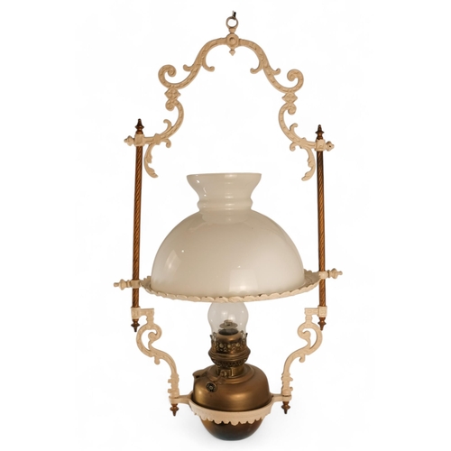 54 - A late 19th century hall lantern - square with stained glass panels and fitted with an oil lamp, 37c... 