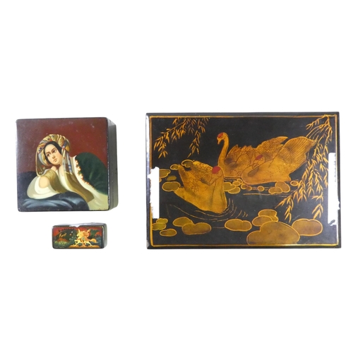 55 - A 20th century Russian papier mache box - the hinged cover decorated with a young woman, signed lowe... 