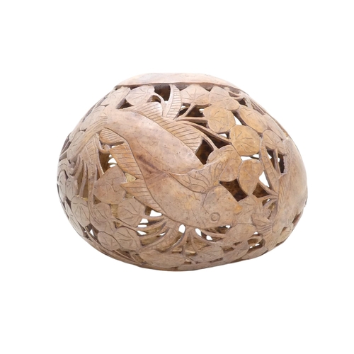 56 - A carved hardwood fish trap - of gourd form and pierced with water plants and carp, 16cm diameter.