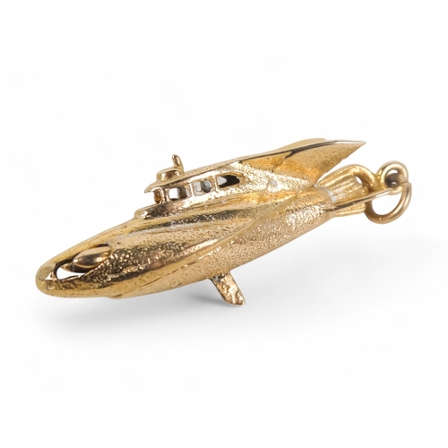 575 - A 9ct gold charm - modelled in the form of Gerry and Sylvia Anderson submarine 'Stingray' with artic... 