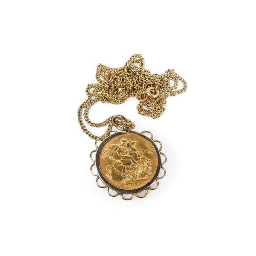 580 - A Victorian sovereign - 1900, within a 9ct frame on a fine link 9ct chain, 16.1g.