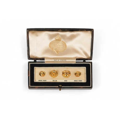 591 - A set of four 9ct gold shirt studs - in smart leather silk lined retail box for D.S. Morgan of Neath... 