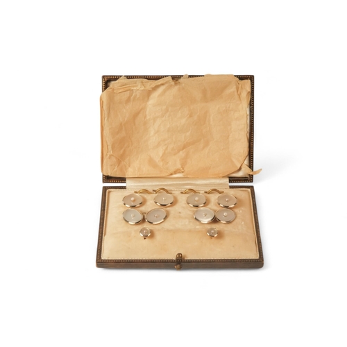 592 - A boxed set of 18ct gold shirt studs and cufflinks - mother-of-pearl and pearl set, 15.6g.