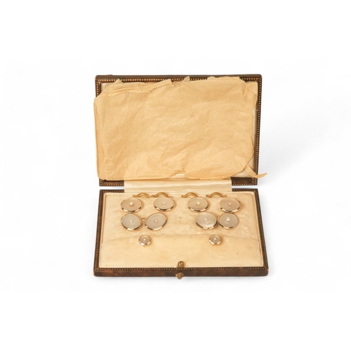 592 - A boxed set of 18ct gold shirt studs and cufflinks - mother-of-pearl and pearl set, 15.6g.