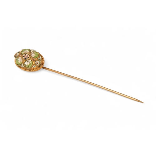 595 - A late 19th century Italian micro mosaic stickpin - oval with floral decoration, 2.3g.