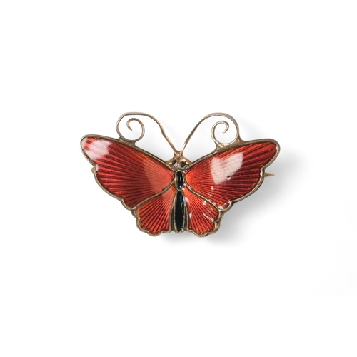 611 - A 20h century Scandinavian enamelled butterfly brooch - together with a silver Chinese symbol brooch... 