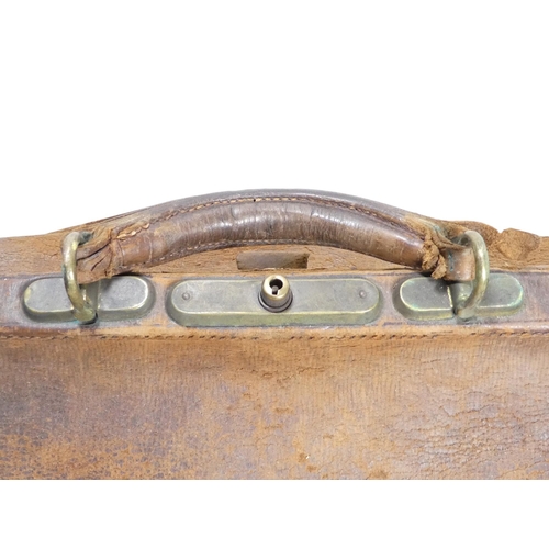 62 - A tan leather Gladstone bag - with a red leather interior, 46cm wide.