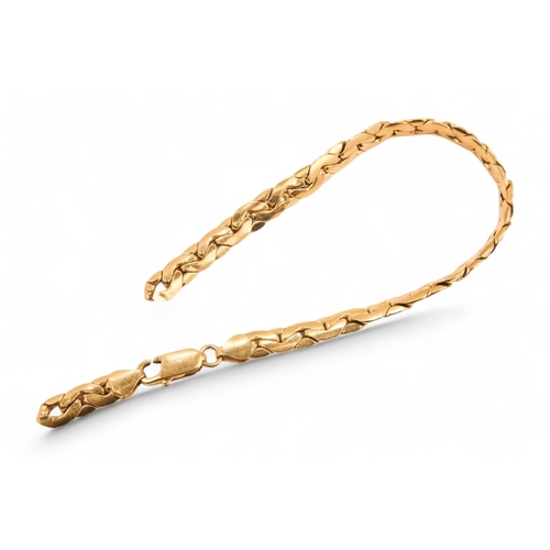 626 - An 18ct gold bracelet - of flattened fancy link, 11.3g.