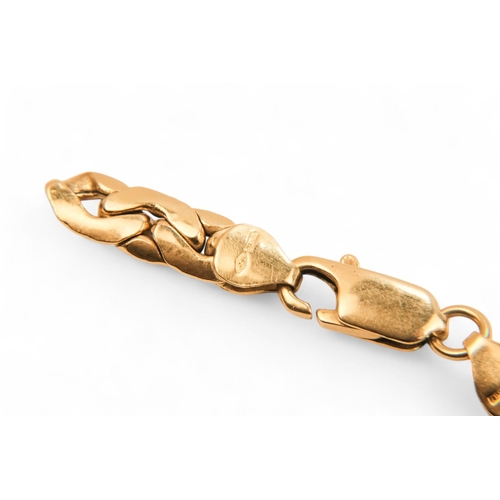 626 - An 18ct gold bracelet - of flattened fancy link, 11.3g.