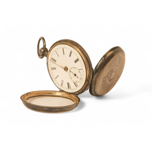 703 - A steel cased pocket watch - the white dial with gilt Arabic numerals and a subsidiary second dial, ... 