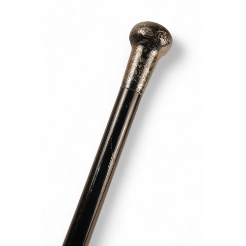 79 - A silver topped cane - indistinctly marked, with a ebonised shaft, 92cm long, together with another ... 