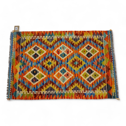 867 - A Chobi kilim rug - 93 x 62cm.