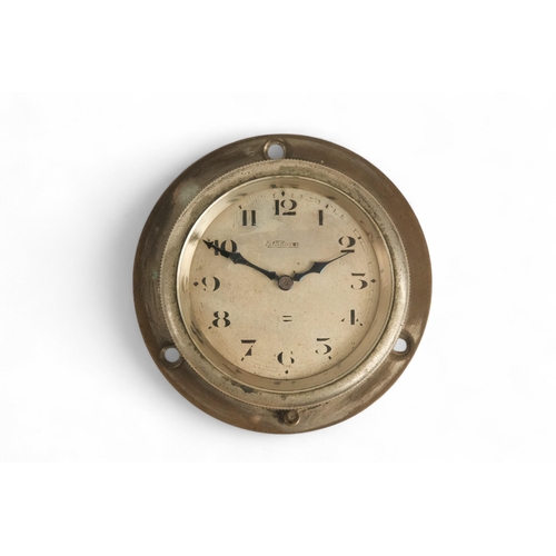 87 - An early 20th century aircraft dashboard clock - nickel plated, the silvered dial set out in Arabic ... 