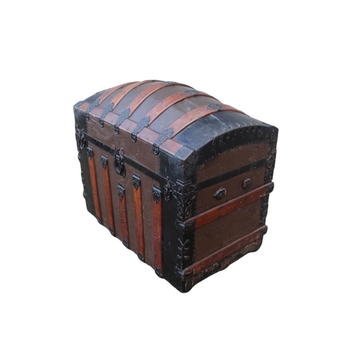 902 - A late 19th century domed trunk - tin on a wooden frame and lathes with steel brackets, 90 x 54 x 79... 