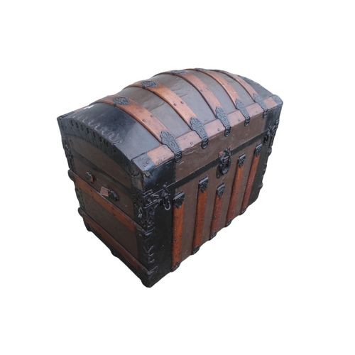 902 - A late 19th century domed trunk - tin on a wooden frame and lathes with steel brackets, 90 x 54 x 79... 