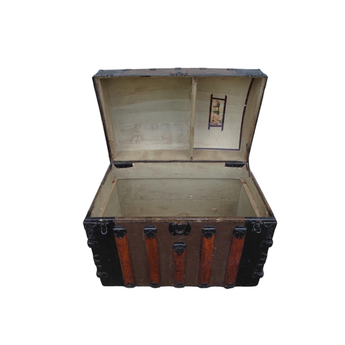 902 - A late 19th century domed trunk - tin on a wooden frame and lathes with steel brackets, 90 x 54 x 79... 