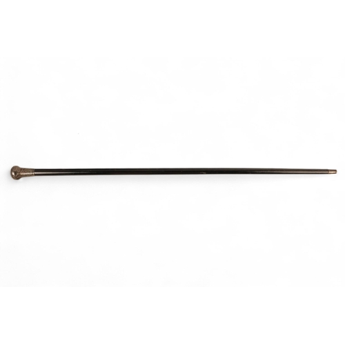 79 - A silver topped cane - indistinctly marked, with a ebonised shaft, 92cm long, together with another ... 