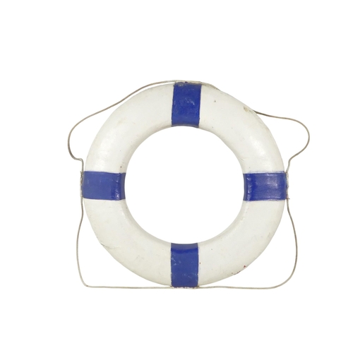 82 - A vintage Perry lifebuoy - canvas covered cork, painted white and blue with a rope band, 76cm diamet... 