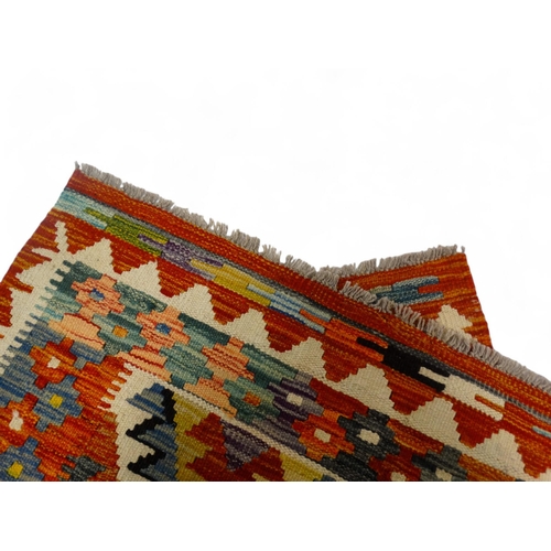 868 - A Chobi kilim rug - 150 x 98cm.