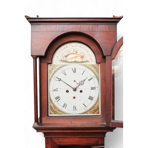 882 - An early 19th century mahogany cased eight day longcase clock - the painted dial decorated with gilt... 