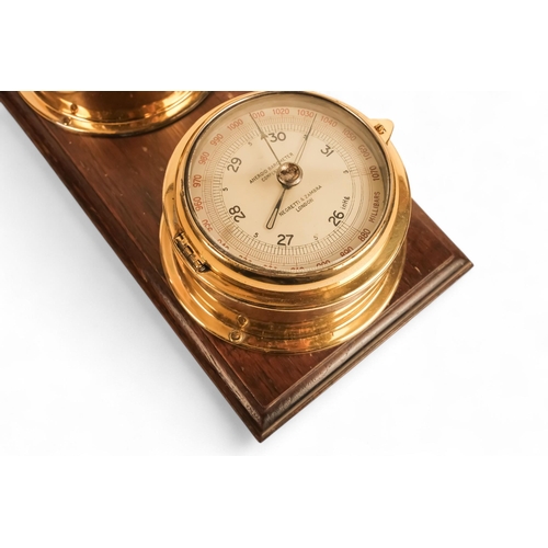 884 - A 20th century brass bulkhead Radio Room clock - marked with green and red radio silence wedges, pai... 