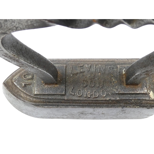 89 - A 19th century cast iron boot scraper - oval, the blade with scrolled supports, 31cm wide, together ... 