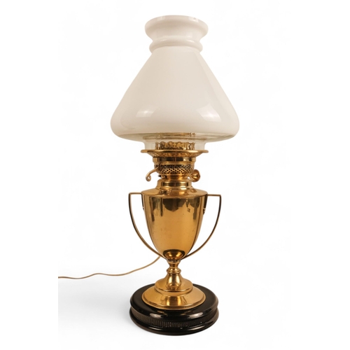 90 - A pair of brass and marble table lamps - raised on square marble bases, together with another table ... 