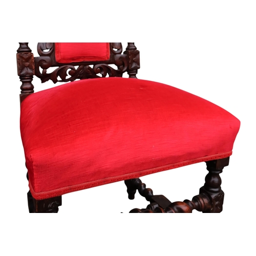 904 - A set of four 17th century style dining chairs - upholstered in red velvet, the pad backs with spira... 