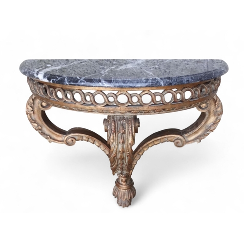 908 - A 19th century carved giltwood and marble topped hall table - possibly Italian, the grey marble D-sh... 