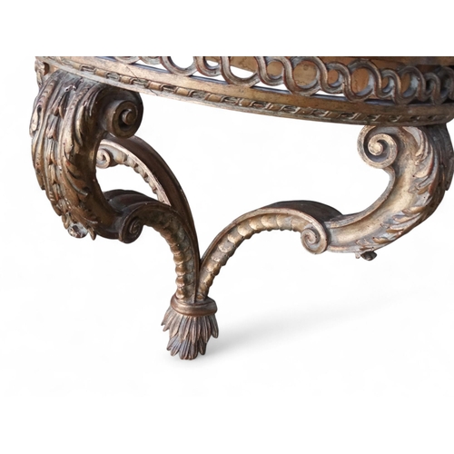 908 - A 19th century carved giltwood and marble topped hall table - possibly Italian, the grey marble D-sh... 