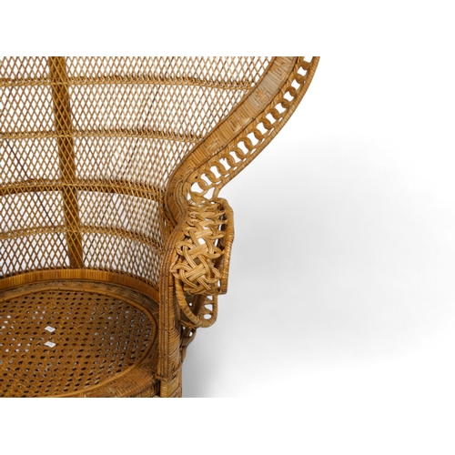 919 - A 1960s bamboo and rattan peacock chair with arched back - with a guilloche border, woven back panel... 