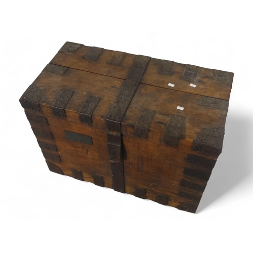 921 - A late 19th century oak and steel bound silver trunk - rectangular with re-enforced corners and bail... 