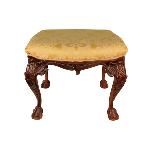 930 - A George II style mahogany stool - with a rectangular gold damask upholstered seat above leaf carved... 