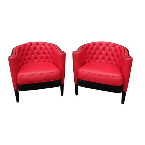 939 - A pair of Moroso leather upholstered tub chairs - button upholstered in red contrasted with black, o... 