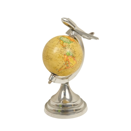 113 - A contemporary globe - surmounted by an aircraft, 25cm high