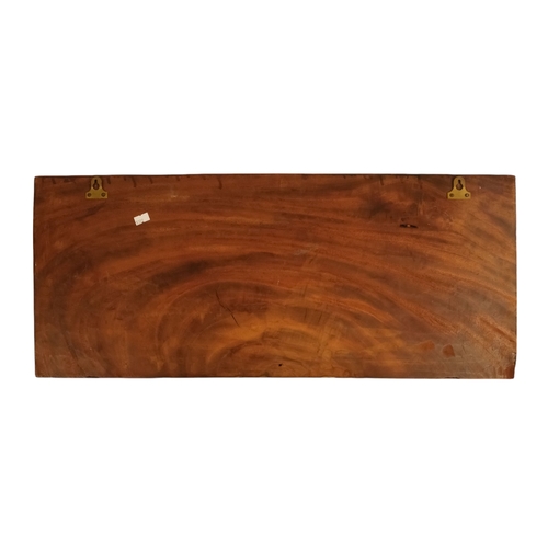 117 - An African fetish - wraped in cloth with twine, 42cm long, together with a carved hardwood palque, d... 