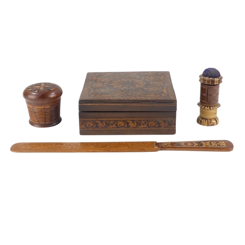 12 - A 19th century Tunbridgeware nutmeg grater - the domed marquetry top above a tapering ribbed body an... 