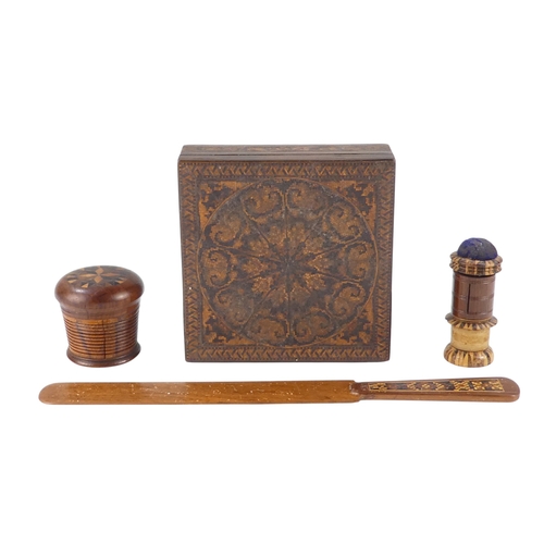 12 - A 19th century Tunbridgeware nutmeg grater - the domed marquetry top above a tapering ribbed body an... 
