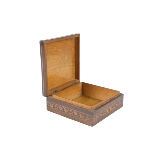 12 - A 19th century Tunbridgeware nutmeg grater - the domed marquetry top above a tapering ribbed body an... 