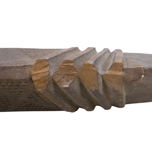 13 - A 19th/20th century Western Australian Aboriginal wunda (shield) - the face carved with a deeply flu... 