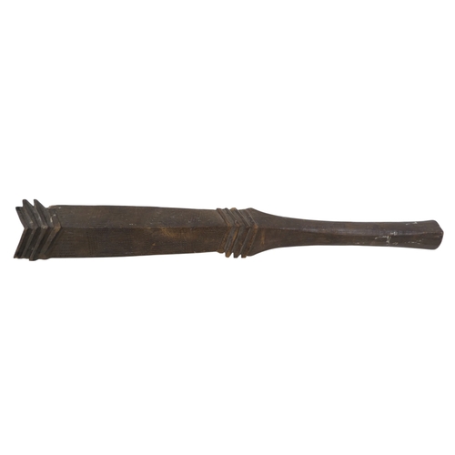 13 - A 19th/20th century Western Australian Aboriginal wunda (shield) - the face carved with a deeply flu... 