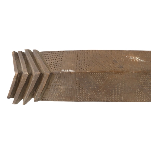 13 - A 19th/20th century Western Australian Aboriginal wunda (shield) - the face carved with a deeply flu... 