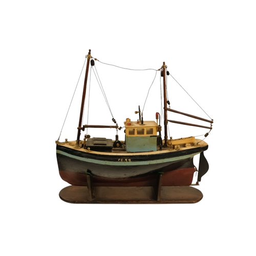 15 - A scratch built model of the fishing trawler Hilda May - FL99, polychrome painted, 51cm long.